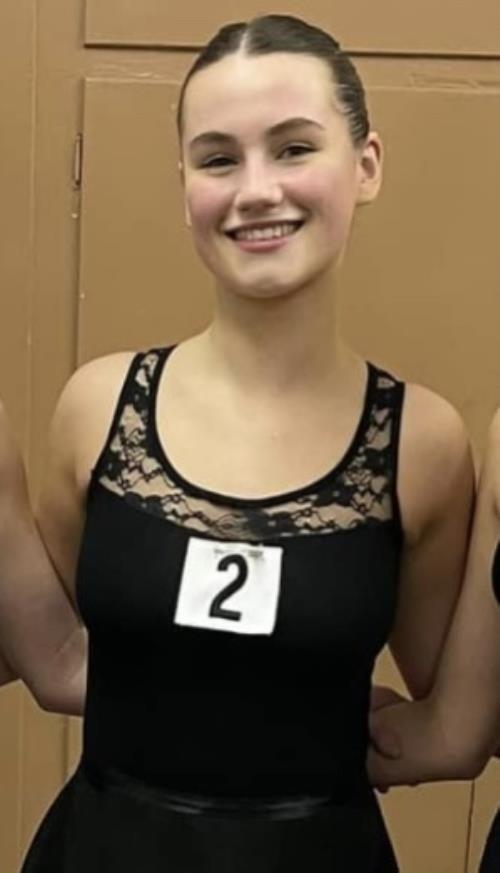 Olivia D achieves a Distinction for her Grade 8 ballet exam